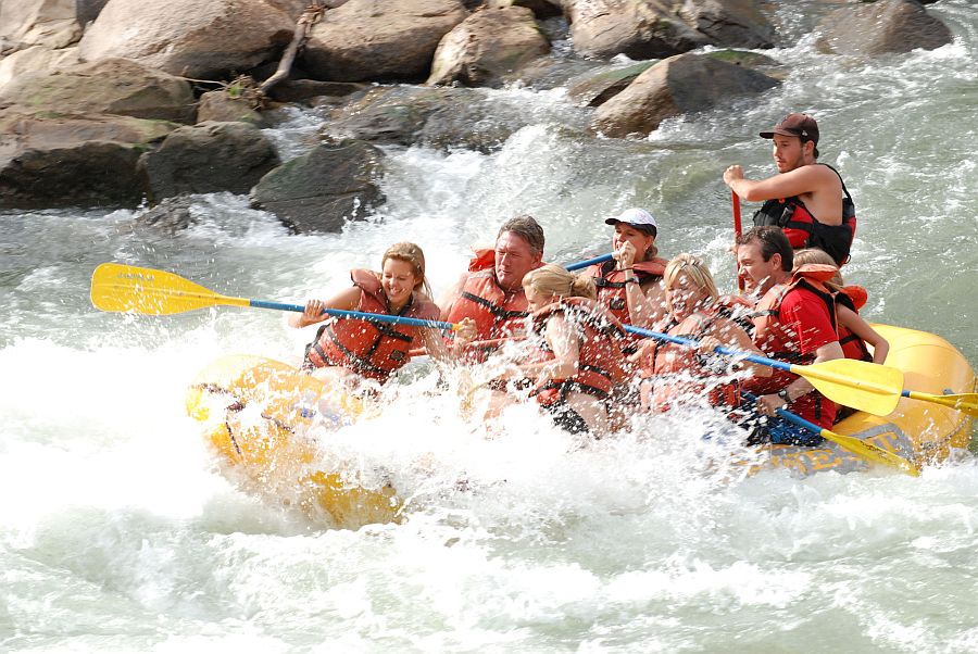 A family white water rafting the Animas River in Durango CO.