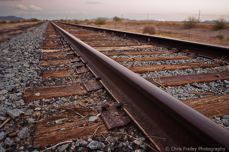 Railroad tracks paving the way in the Arizona Desert.