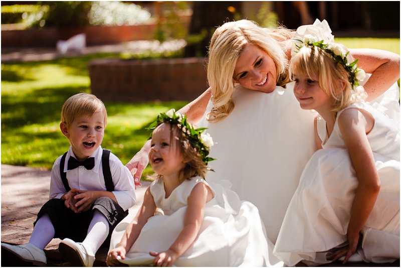 A bride with the flower girl and ring bearer