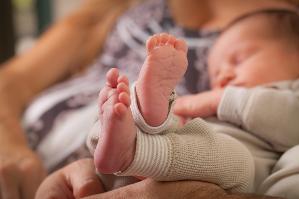 A newborn baby boy's feet. 