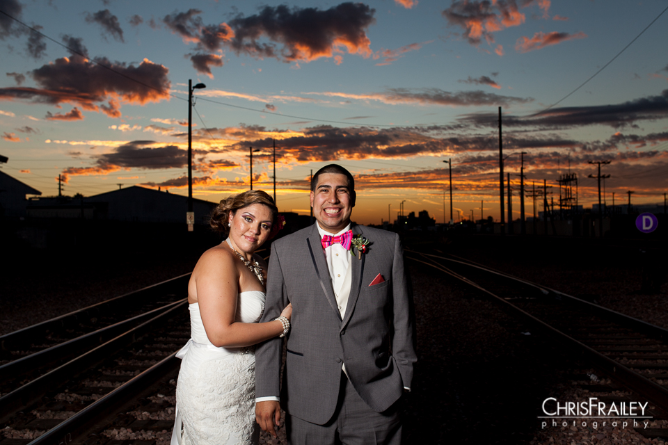 Tre Bella Wedding bride and groom on the railroad tracks at dusk