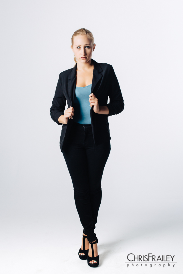 Model wearing a pant suit for a studio shoot. 