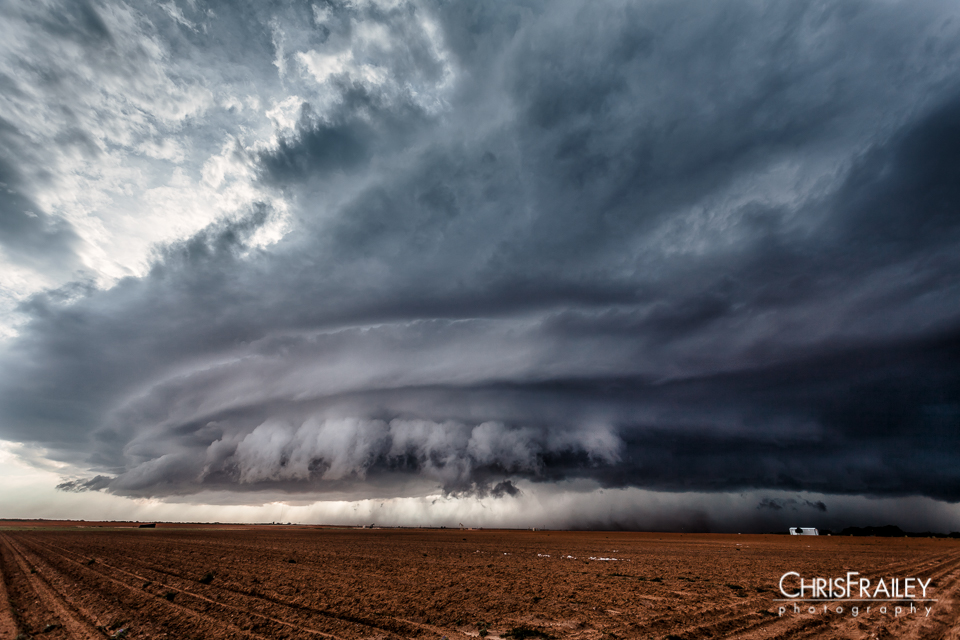 A supercell thunderstorm rolls across farm land south of Lamesa Texas.