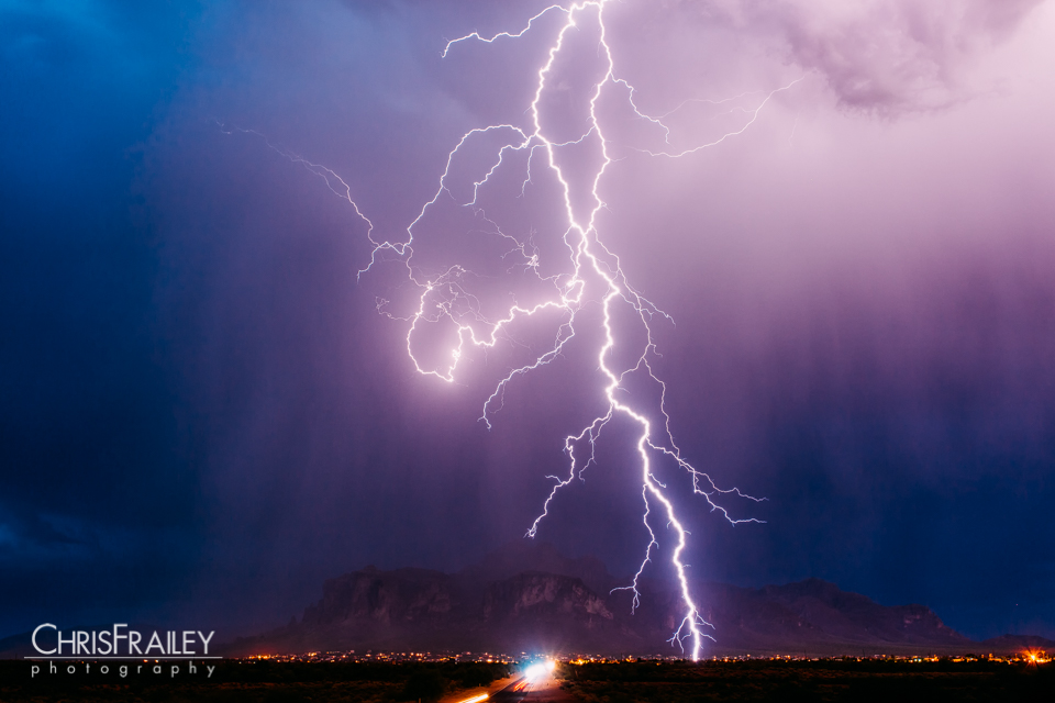 Lightning strikes in front of the Superstition Mountains during a monsoon storm.