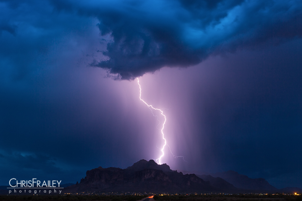 Lightning strikes the top of the Superstition Mountains during a monsoon storm.
