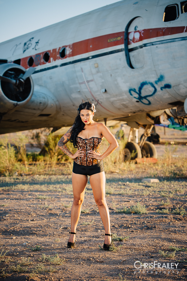 Abandoned airplane and model posing