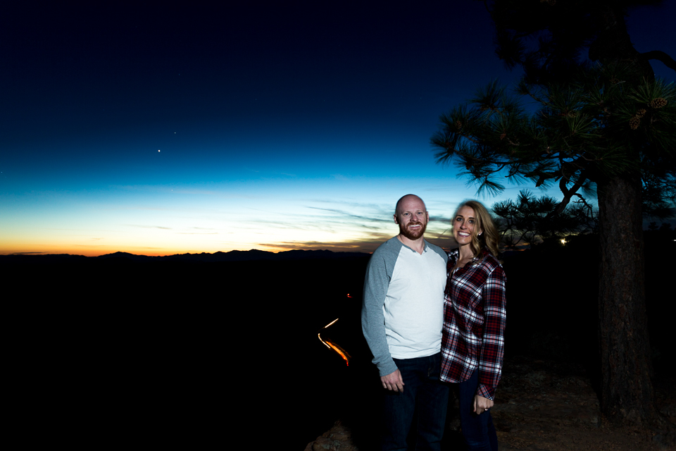 Sunset photo of a couple at dusk with stars in the sky.