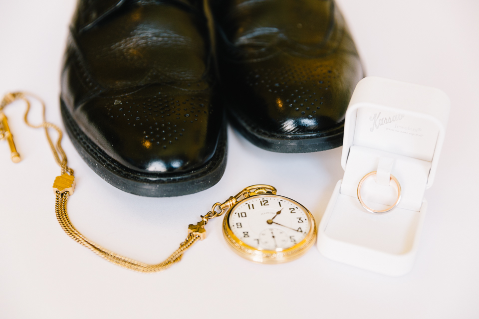 Groom's shoes and pocket watch
