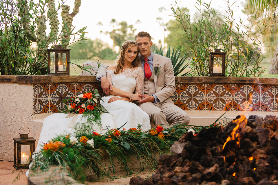 Bride and groom enjoying an outdoor fire pit at the styled wedding shoot at the Scottsdale Resort.