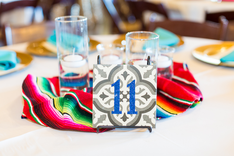 Table center piece with small Mexican blanket.