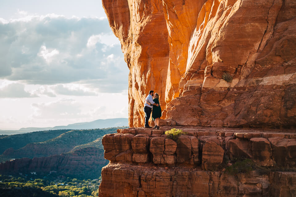 Couple posing for their Cathedral Rock engagement session.