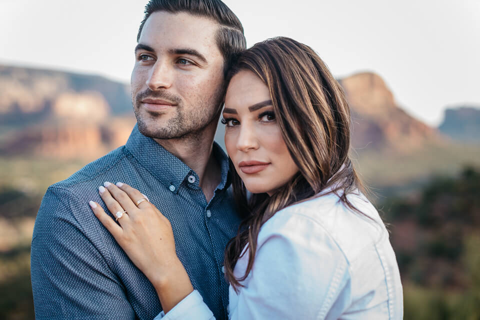 Close up of engaged couple on top of Airport Mesa. 