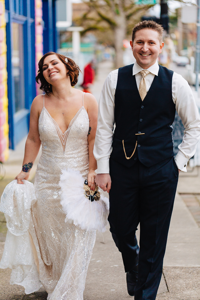 Bride and groom walking the streets of Portland.