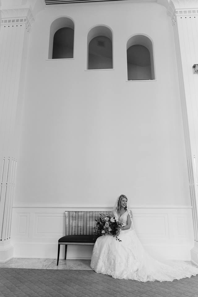 Bride sitting on a bench